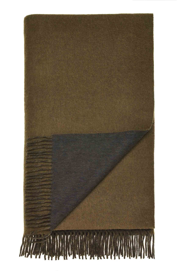 Brown blanket with fringed edges on a white background