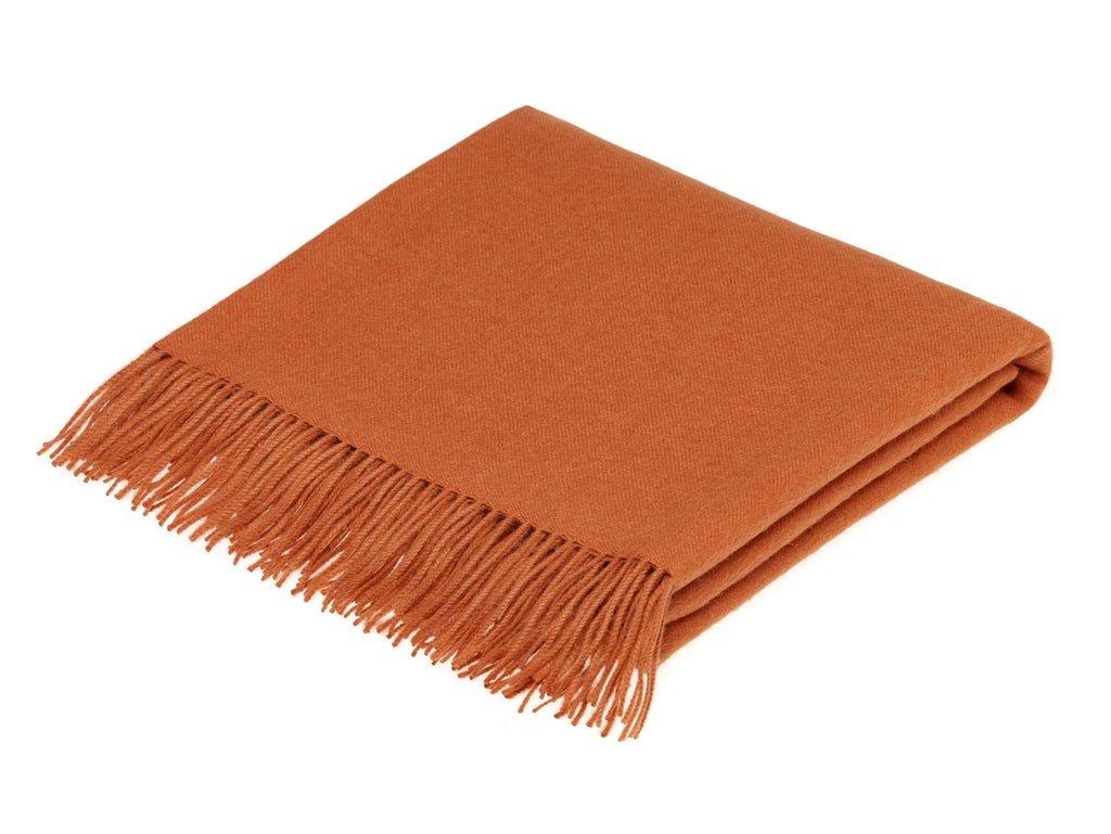 plain terracotta throw blanket made from alpaca by bronte moon